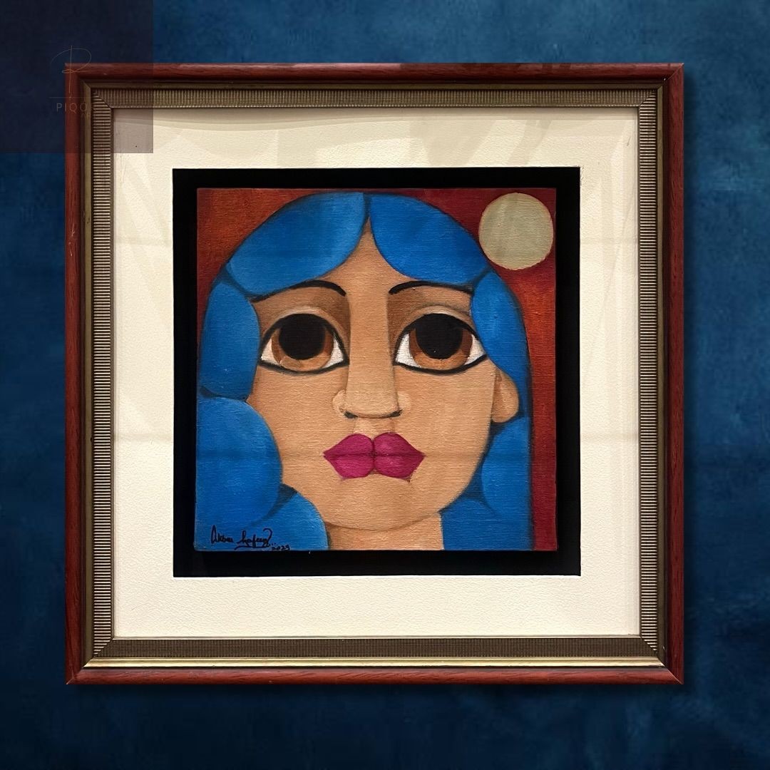 Framed abstract painting with blue and red background, featuring signature at the bottom left corner.